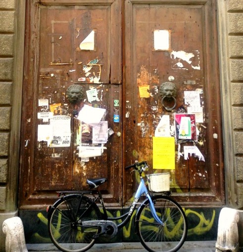 Bike and door in Italy